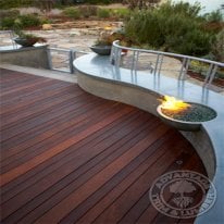 Ipe decking with a fire pit molded into the sitting area.