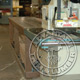 This is our straight-line rip saw.  This is used to rip boards to a specific width per custom specifications.