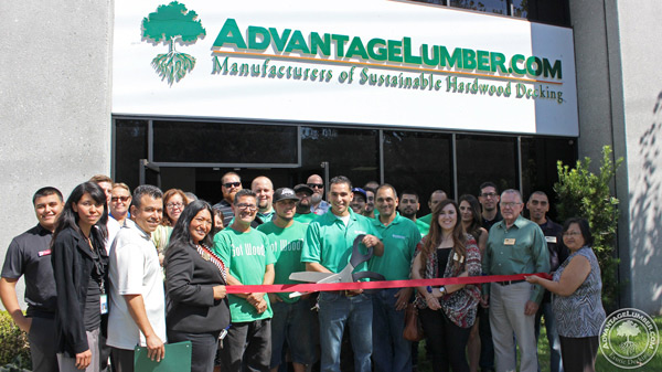 Members of the AdvantageLumber.com family and the Chamber of Commerce ready to cut the Red Ribbon