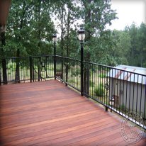 Cumaru compliments this metal railing perfect!