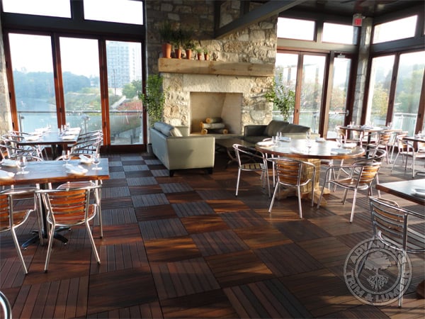 This relaxing area feels complete with a warm walking suface composed of wood deck tiles.