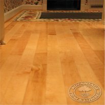 Close-up view of kitch floor done with Bird's Eye Maple.