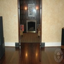 Beautiful den done with Black Walnut flooring.