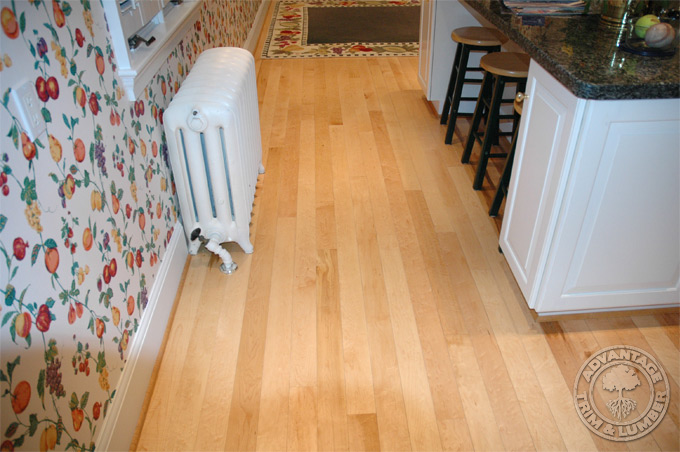 Kitchen with beautiful hardwood flooring.