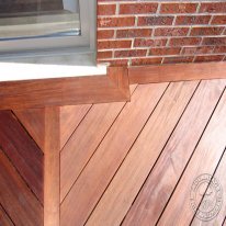 The main deck flooring is laid diagonally, with a picture frame around the whole thing. In order to picture frame, you need double rim joists around your deck. Mine were 2" apart. This gap also served as a "mortise" for the post railing. Each 4x4 railing post received a 2"x2" 7" long tenon on the end. This tenon slips down through the gap in the rim joists and everything is bolted together. The floors was designed to not have a single butt joint. That's why I designed the deck in CAD, so I would know just how many 8' through 20' long 5/4 deck boards I would need to order. All the decking was secured with Ipe clips. Where this was not possible (picture frame and ends), countersunk screws were used and plugged with Ipe.