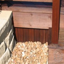 In order to keep the animals out, the underside of the deck receives 4/4 siding. Again...screwed from the back-side to conceal the fasteners. You can also see the fascia in this picture and picture framed stair.