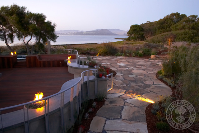 Ipe deck shown at night with the surrounding landscape.