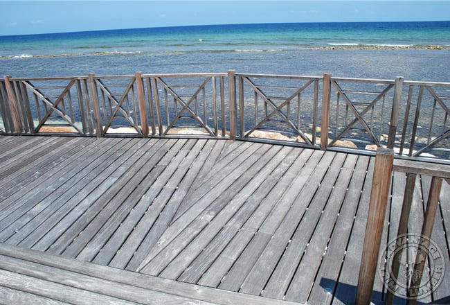 Years of salt water, salt air, intense heat and UV rays have not made a dent in the ipe decking's performance. The only noticeable change is how well the wood has matured to a patina grey.