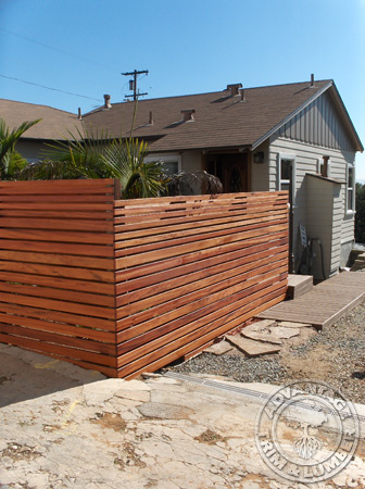 Tigerwood is a versatile building material that makes a unique privacy fence.
