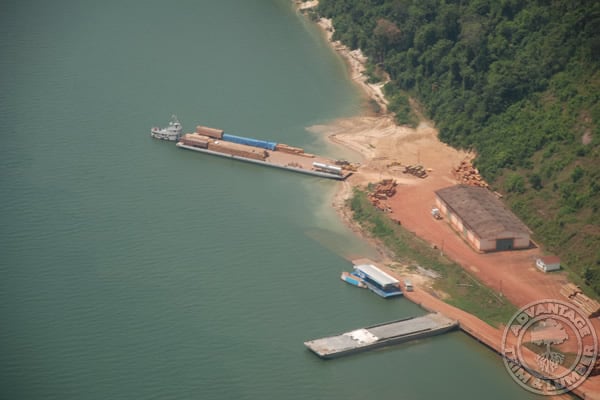 Ariel view of local port delivering decking, fuel, and other supplies.