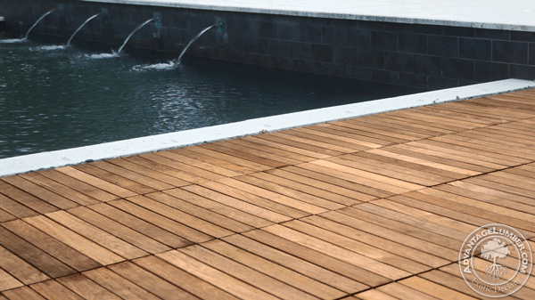 This pool's sleek modern look is contrasted nicely by the natural look of Advantage Deck Tiles™.