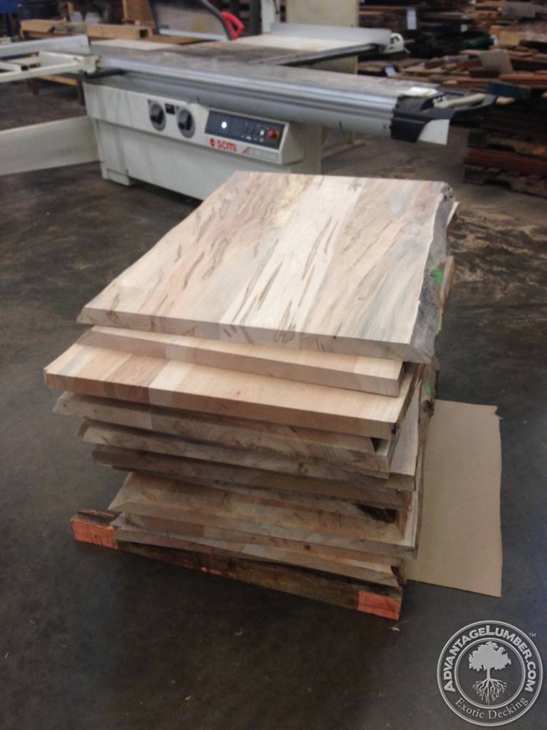 Ambrosia table tops with live edges being prepared to be shipped to a chain of restaurants in North Carolina, South Carolina, and Florida