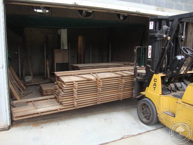 Brazilian hardwood being taken out of our North Carolina kiln after reaching a moisture content for interior use